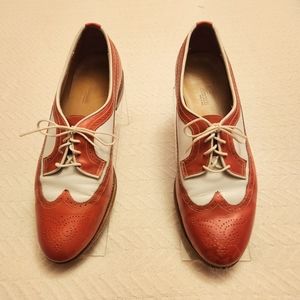 Women's Allen Edmonds wing tips. Moderate wear with slight scuffs.